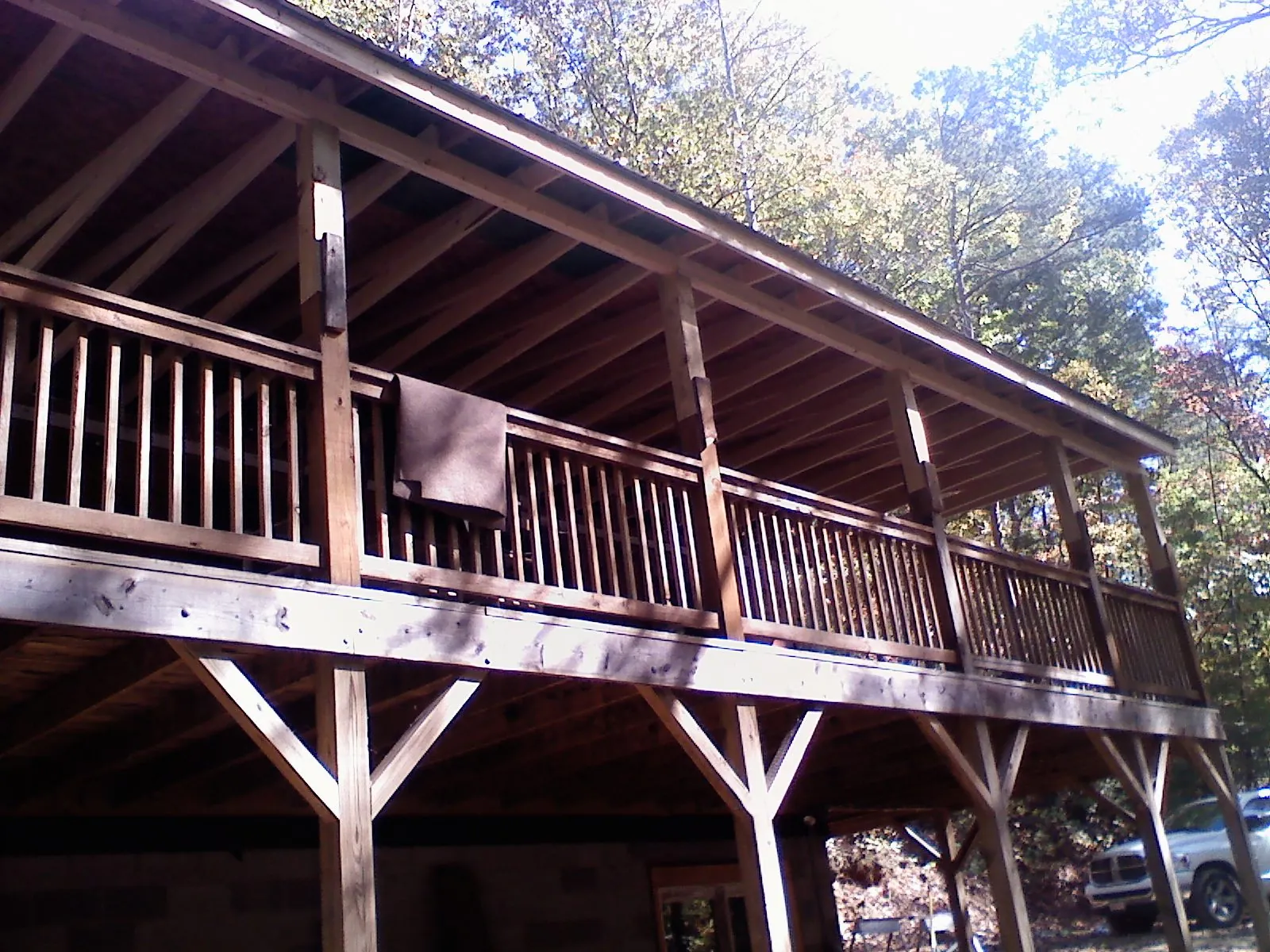 Timber framing under a new elevated porch and deck — Roof Leak Repair in West Nottingham by Roofing Brothers